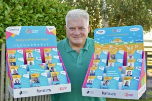 Andy Goff with career cards