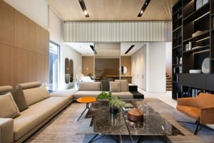 Modern living room with sectional sofa and bookshelf