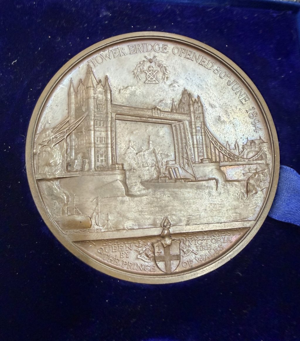 Medal showing tower