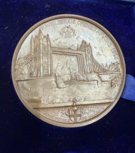 Medal showing tower